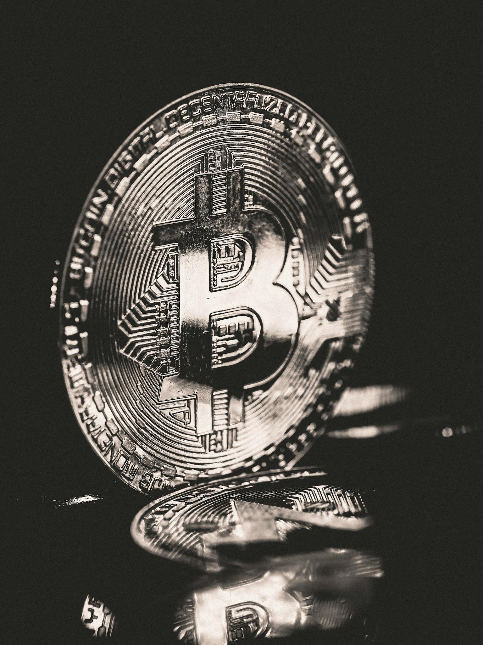A close-up of a Bitcoin coin symbolizing cryptocurrency. Ideal for finance and digital currency themes.